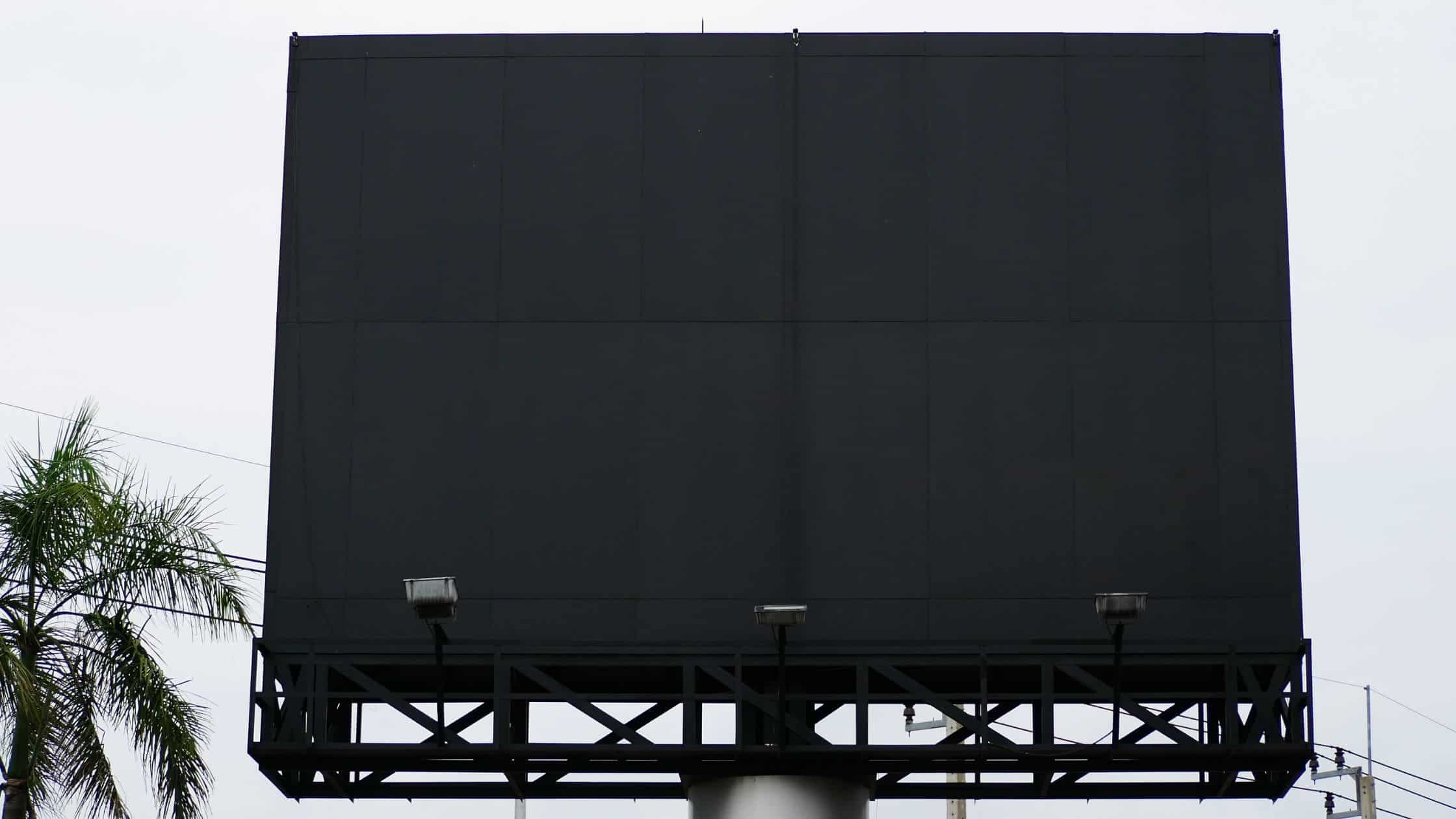 Outdoor LED display permanently installed on a commercial building facade