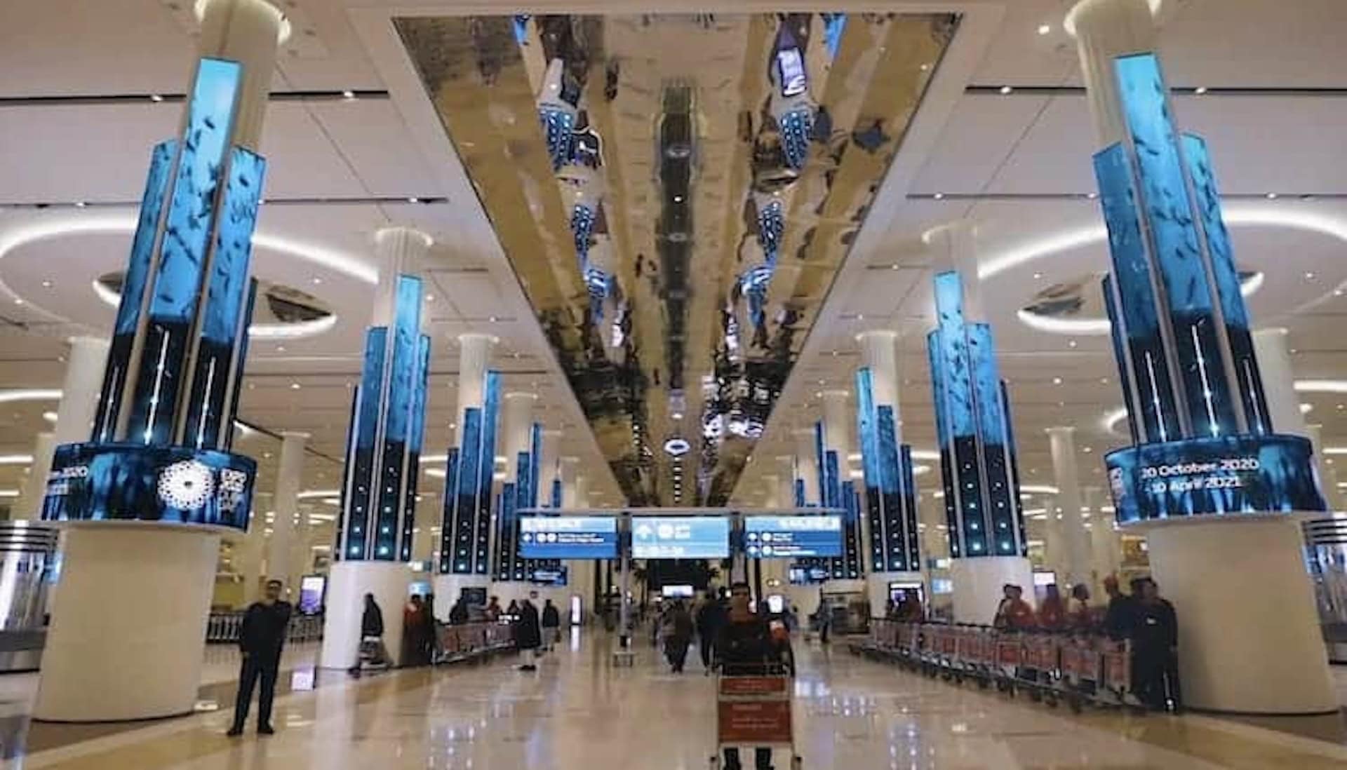Large-scale LED display structures installed at Dubai International Airport Terminal 3 arrivals hall