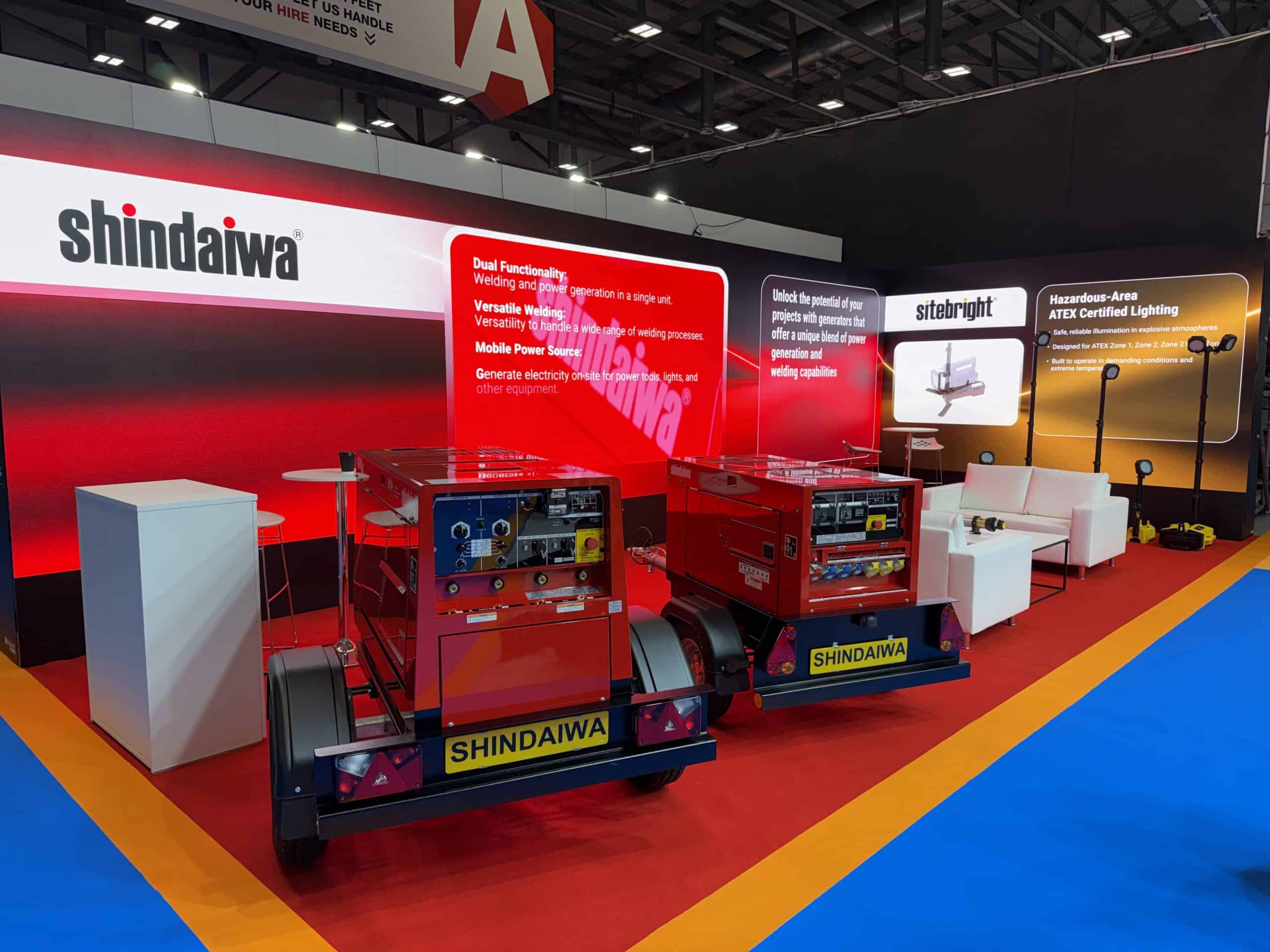 Right‑angle (L‑shape) exhibition LED wall on a shelf for Shindaiwa stand at Coventry Building Society Arena.