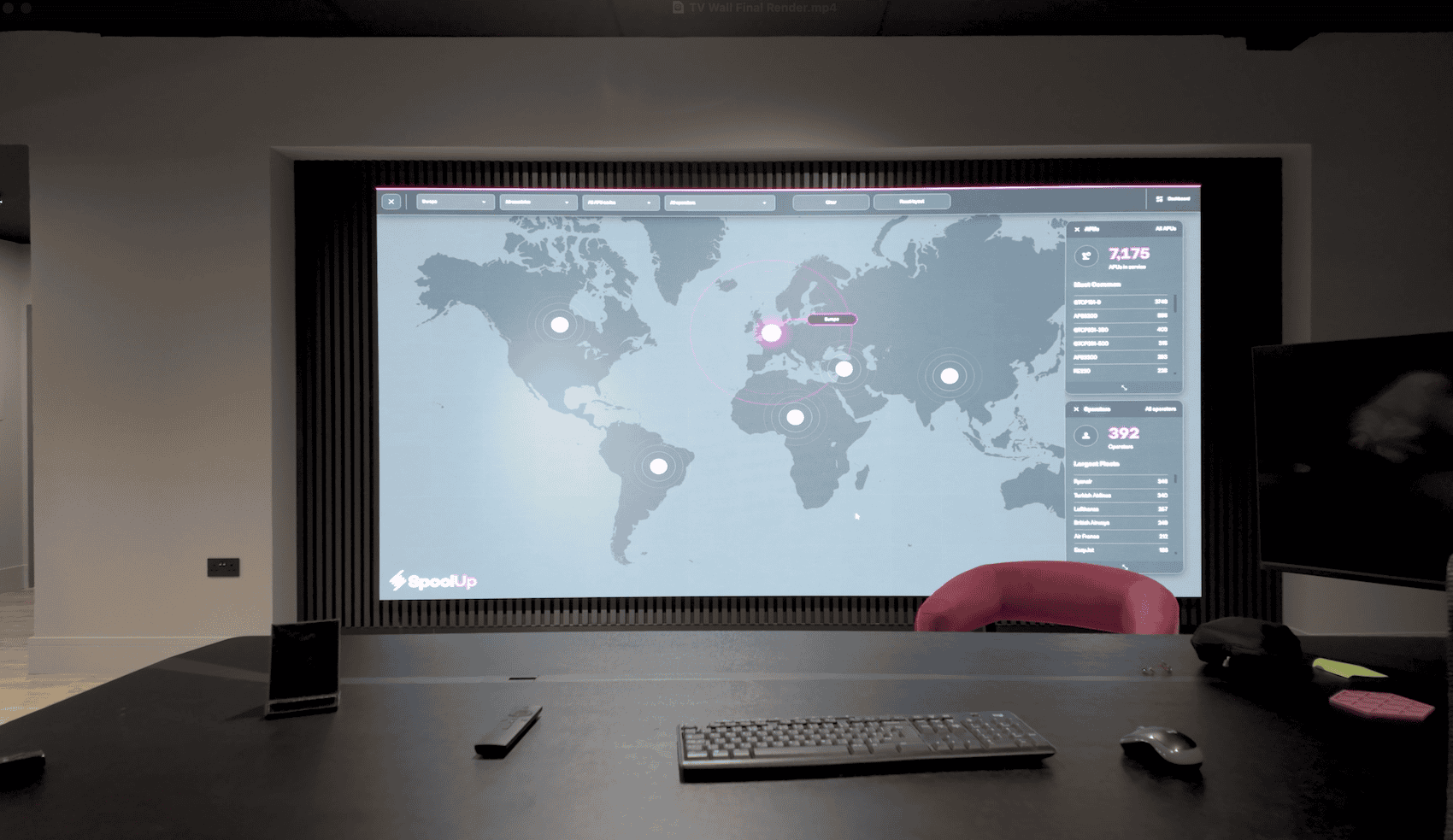 Modern boardroom featuring a seamless LED video wall displaying financial data.