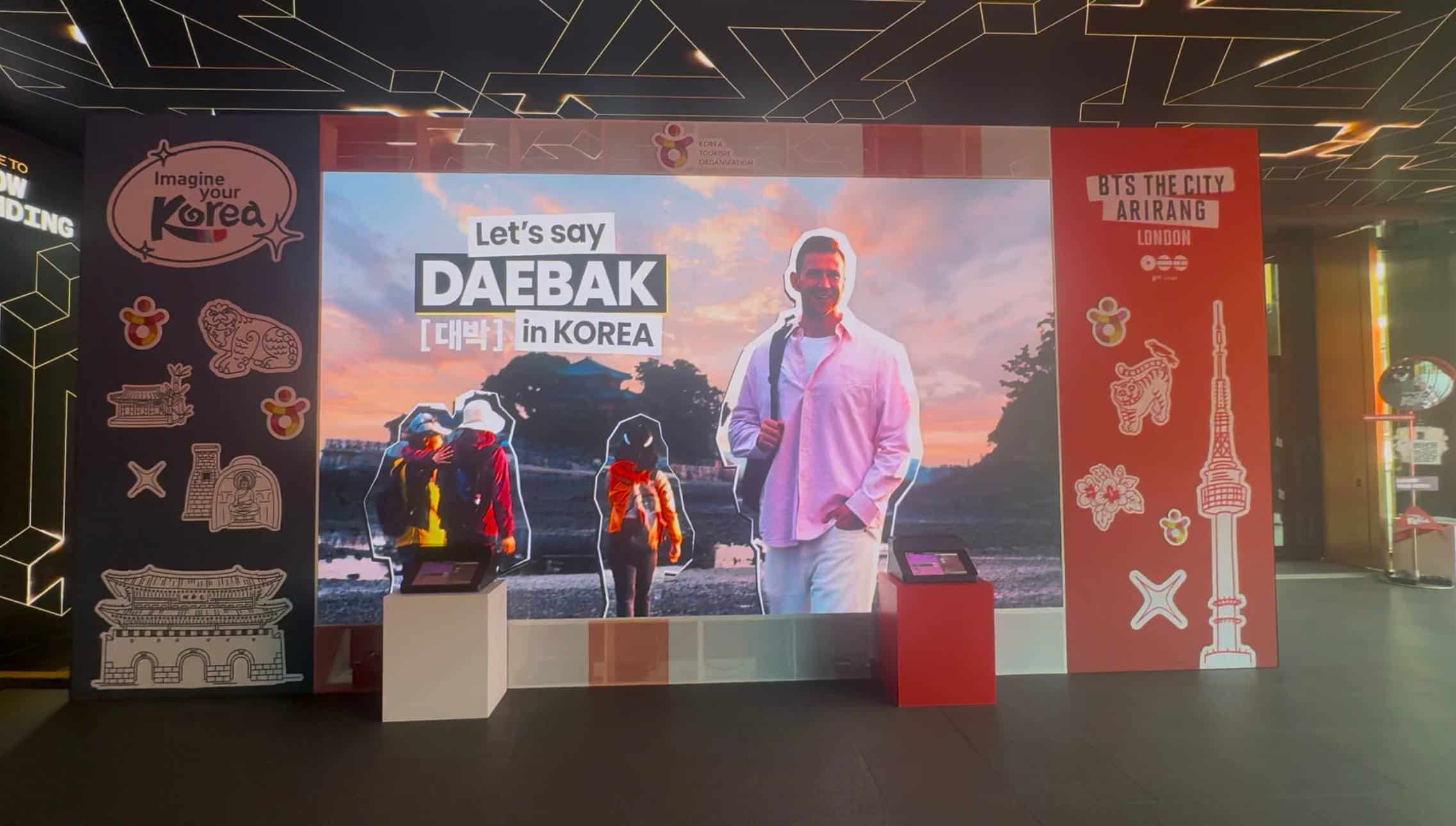 Front view of the 4,960 x 2,976 mm DRE Series P1.29 LED wall built into the printed timber stand at the BTS The City Arirang London activation