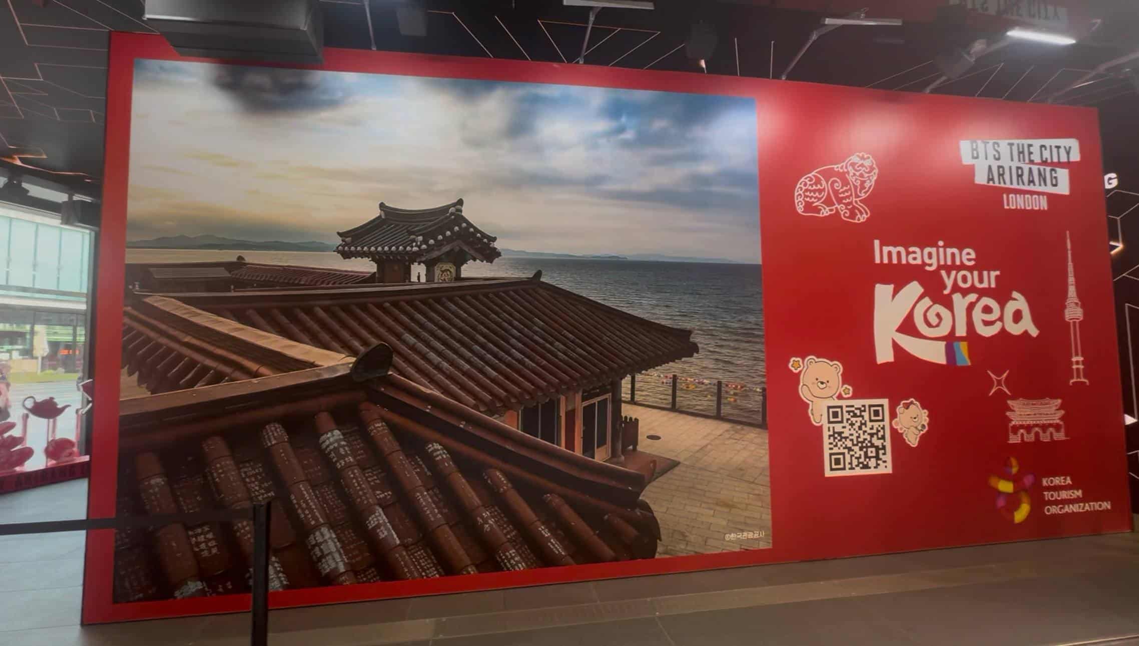Printed graphics wall of the BTS The City Arirang London stand, fabricated and installed under Dynamo's management