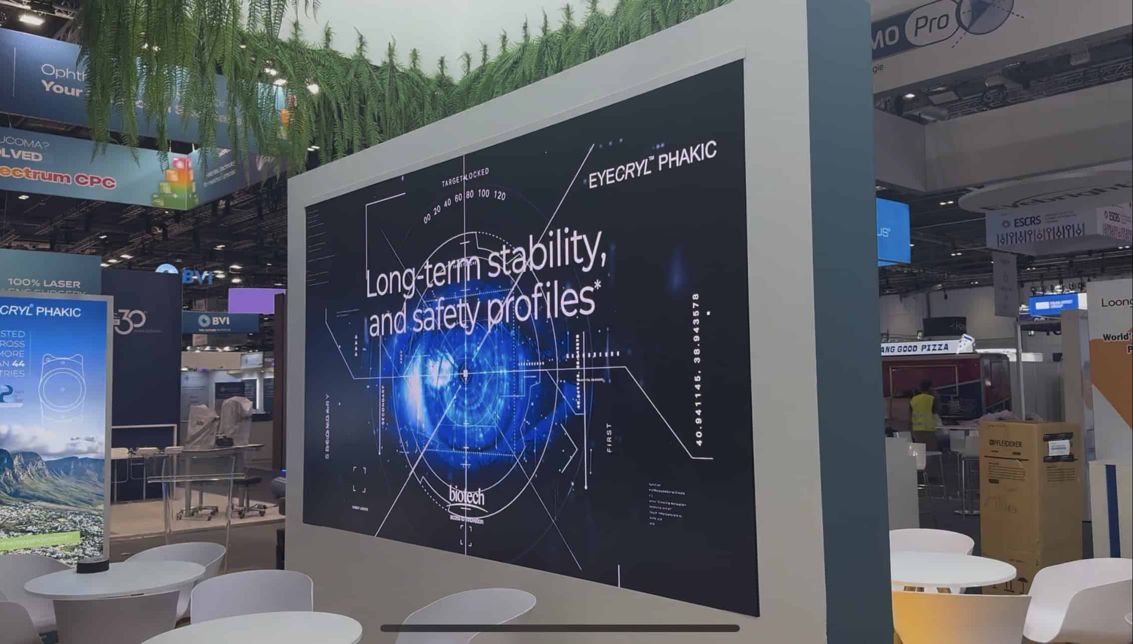 3 m x 2 m fine-pitch LED booth wall on the Biotech stand at ESCRS 2026 showing EYECRYL PHAKIC lens content at close range